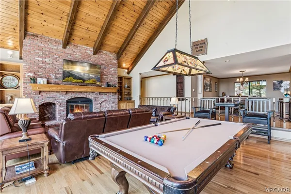a view of a kitchen with furniture and fireplace
