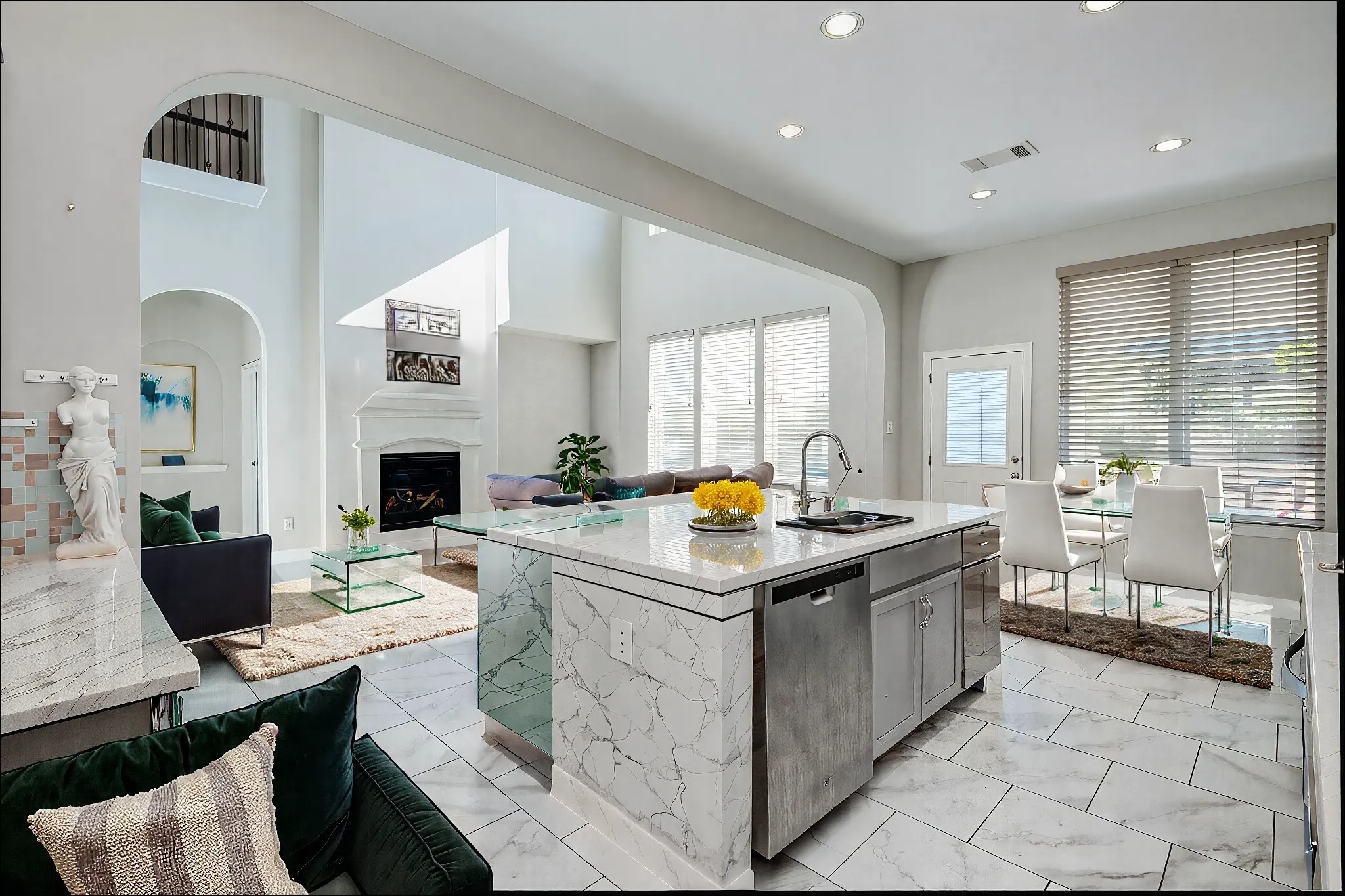 23527 San Ricci Court Richmond, TX 77406 - Photo 12 of 37 a kitchen with stainless steel appliances kitchen island granite countertop a sink and a stove