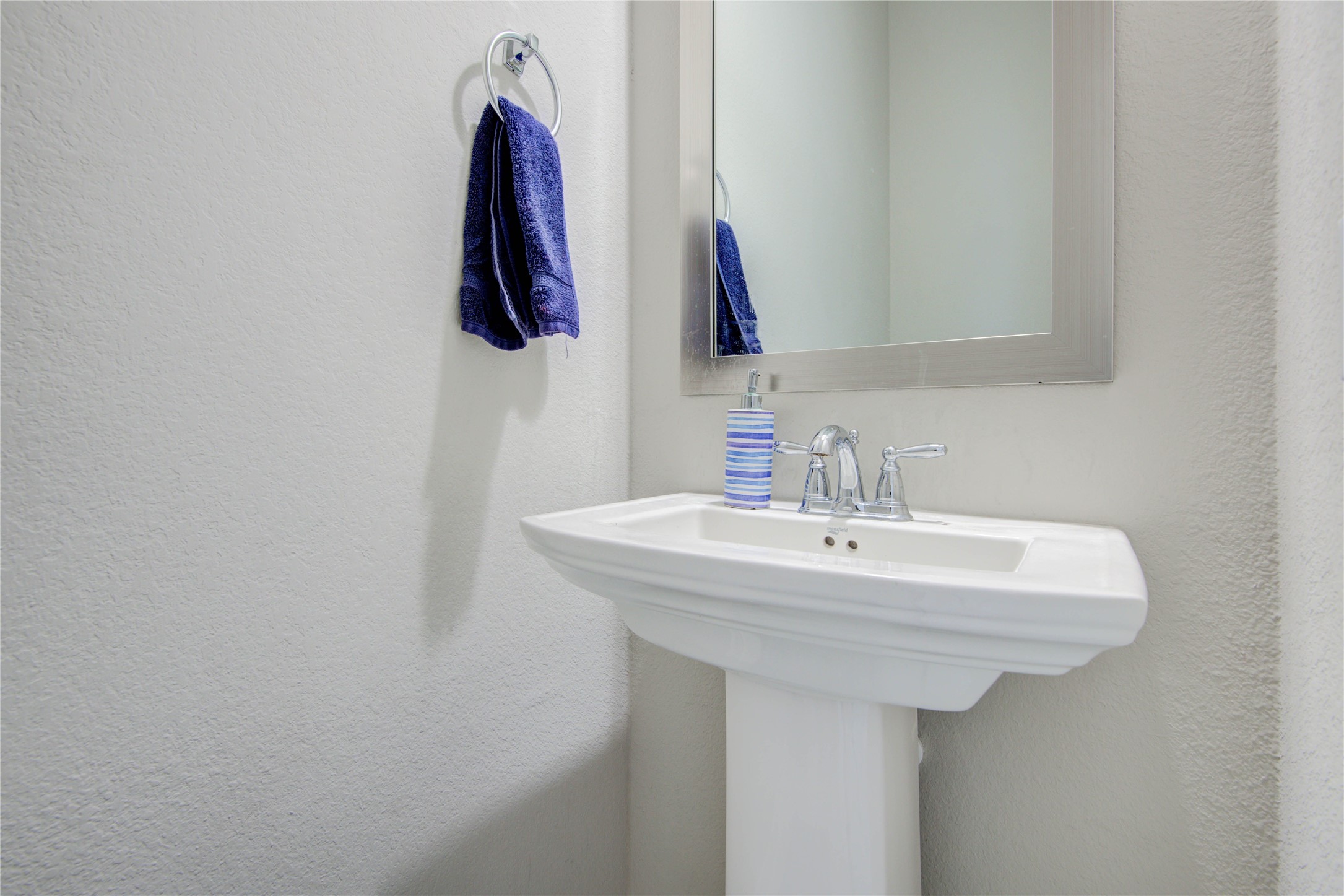 23527 San Ricci Court Richmond, TX 77406 - Photo 15 of 37 a bathroom with a sink and a mirror