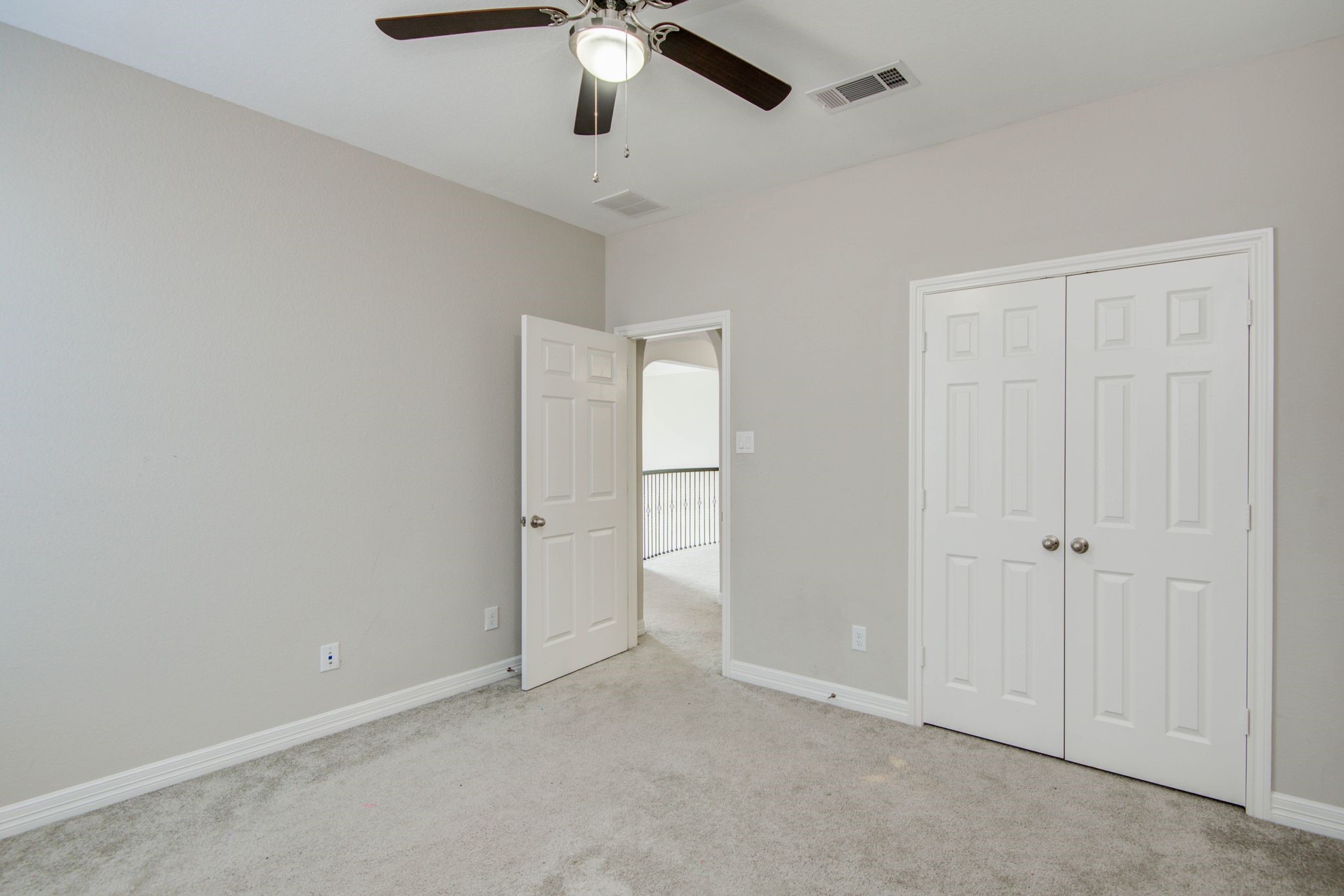 23527 San Ricci Court Richmond, TX 77406 - Photo 20 of 37 an empty room with chandelier fan