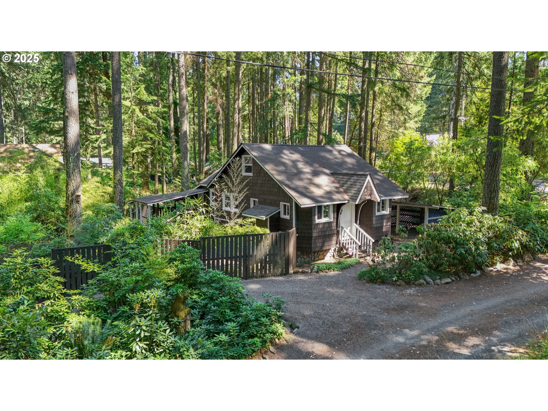 24082 East Decatur Road Welches, OR 97067 - Photo 2 of 44 a view of a house with a yard