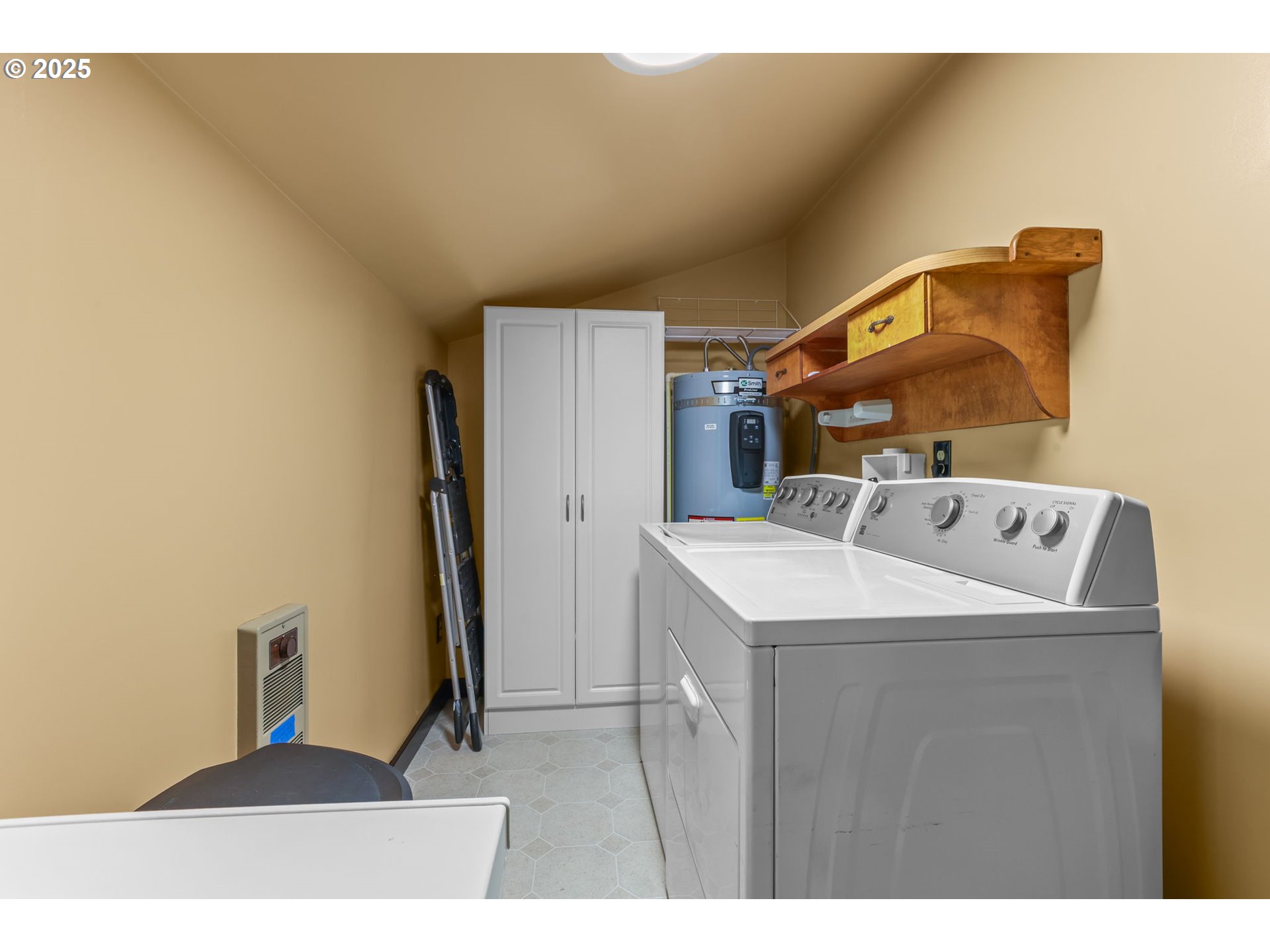 24082 East Decatur Road Welches, OR 97067 - Photo 25 of 44 a kitchen with a sink a refrigerator and washer