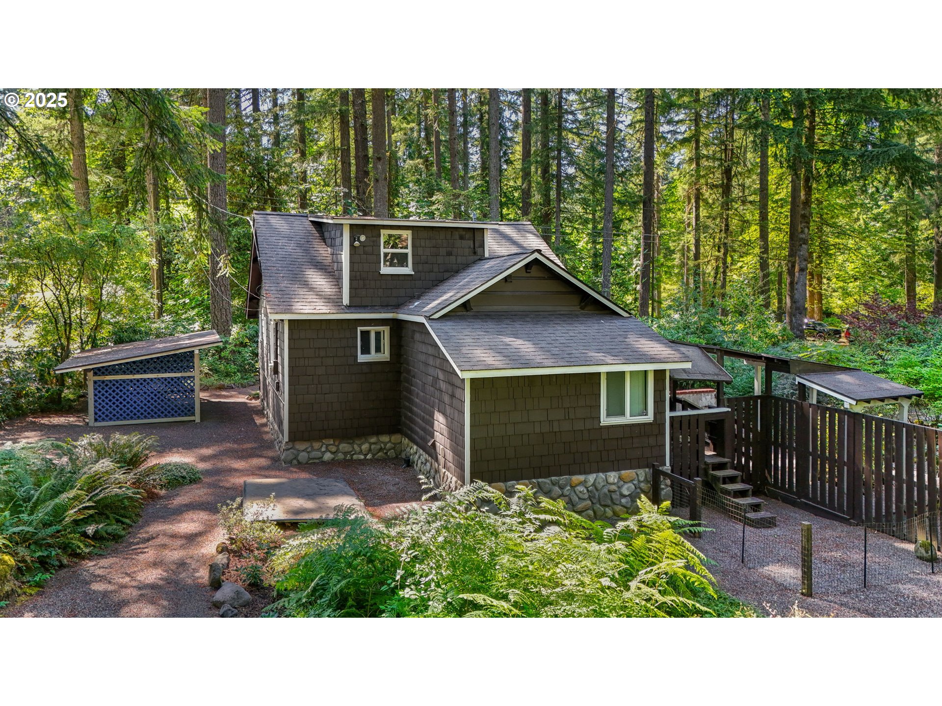 24082 East Decatur Road Welches, OR 97067 - Photo 29 of 44 a view of house with backyard