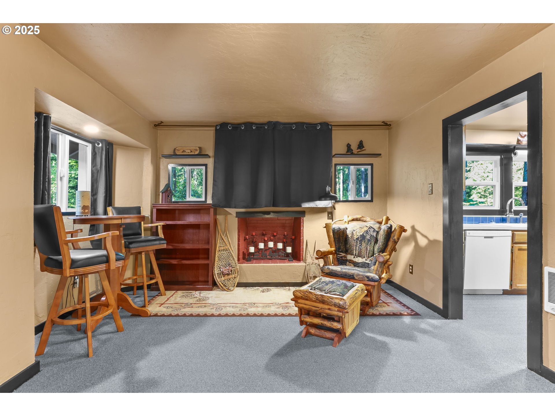 24082 East Decatur Road Welches, OR 97067 - Photo 5 of 44 a living room with furniture and a fireplace