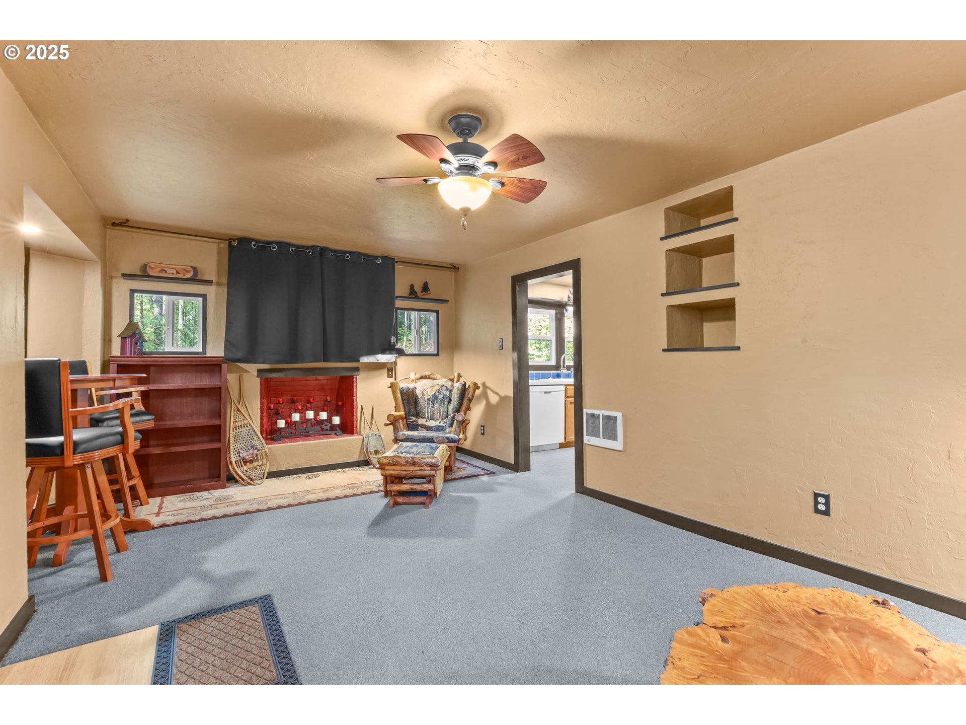 24082 East Decatur Road Welches, OR 97067 - Photo 8 of 44 a living room with furniture and a chandelier