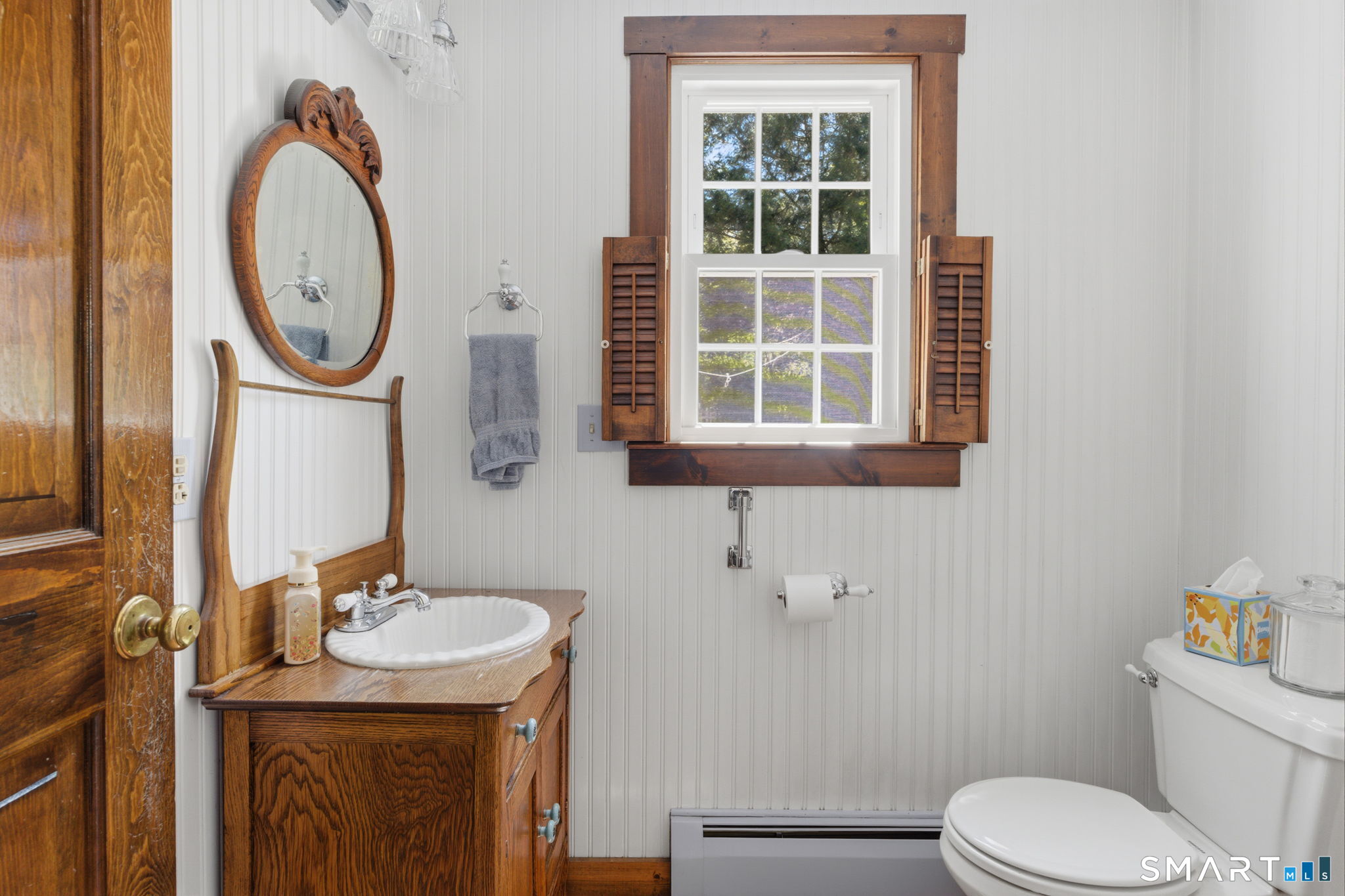 79 Buckboard Lane Bristol, CT 06010 - Photo 27 of 40 a bathroom with a granite countertop toilet sink and mirror