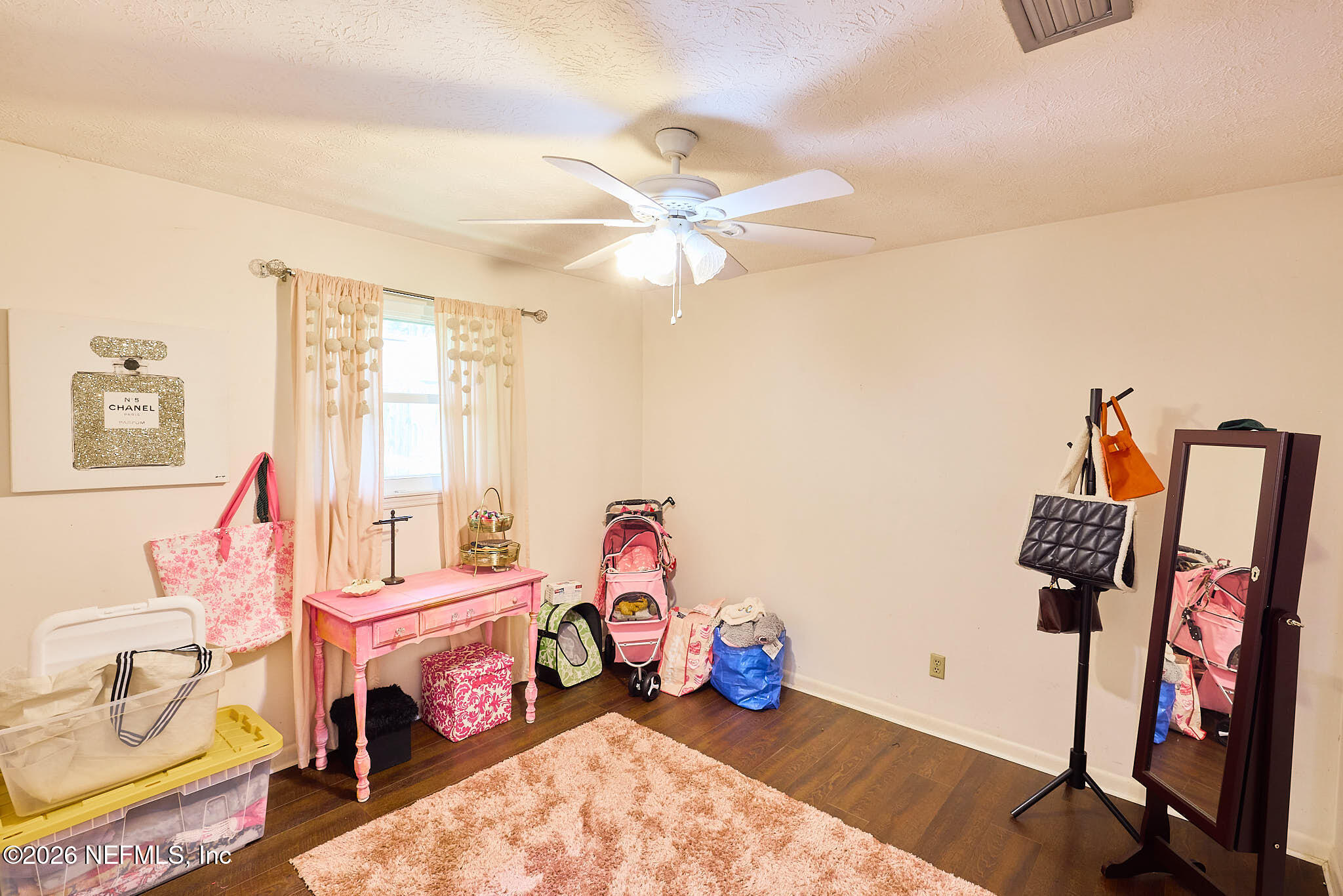 8965 San Rae Road Jacksonville, FL 32257 - Photo 14 of 46 a bedroom with furniture and a window