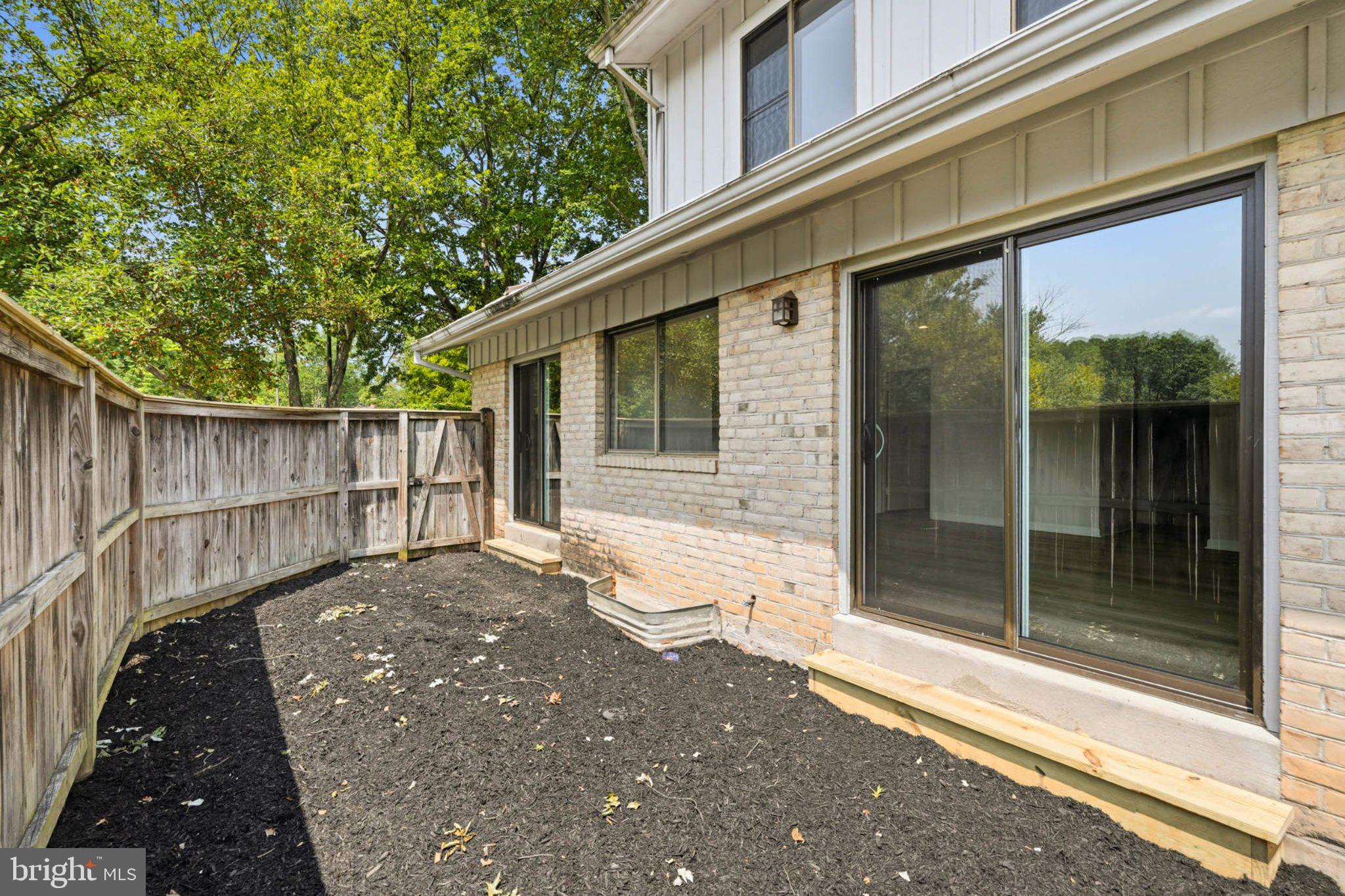 10901 Trotting Ridge Way, Unit 92 Columbia, MD 21044 - Photo 32 of 37 Private outdoor retreat with greenery.