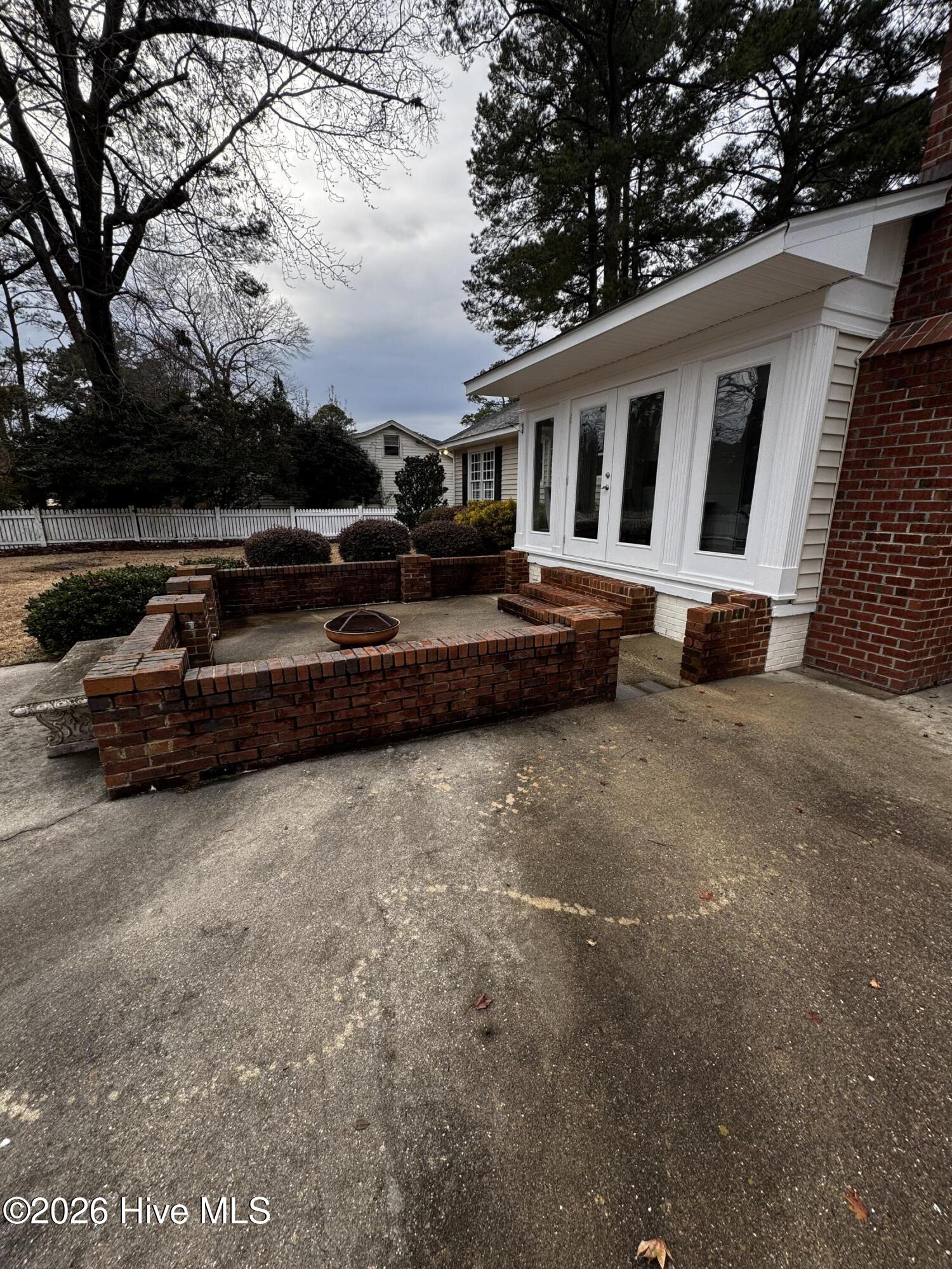 1220 Stockton Road Kinston, NC 28504 - Photo 2 of 23 Patio overlooking back yard and golf course