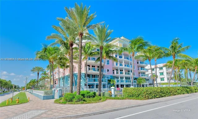 a front view of a building with garden