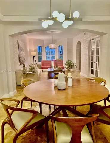 a kitchen with stainless steel appliances granite countertop a stove and a sink