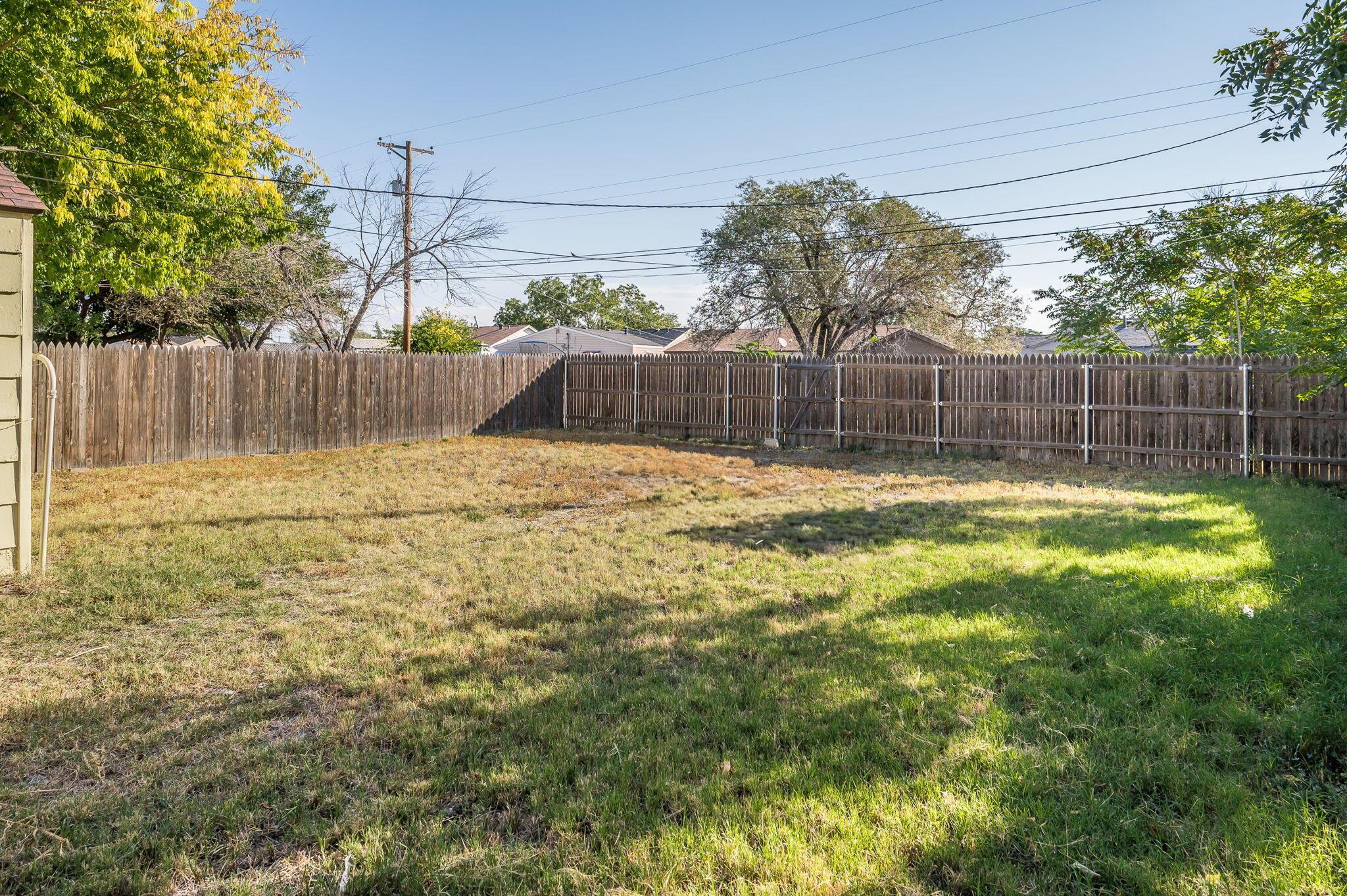 4207 South Ong Street Amarillo, TX 79110 - Photo 15 of 16 a swimming pool with a outdoor space