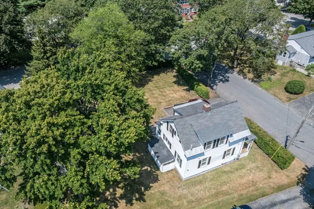 an aerial view of residential house with outdoor space