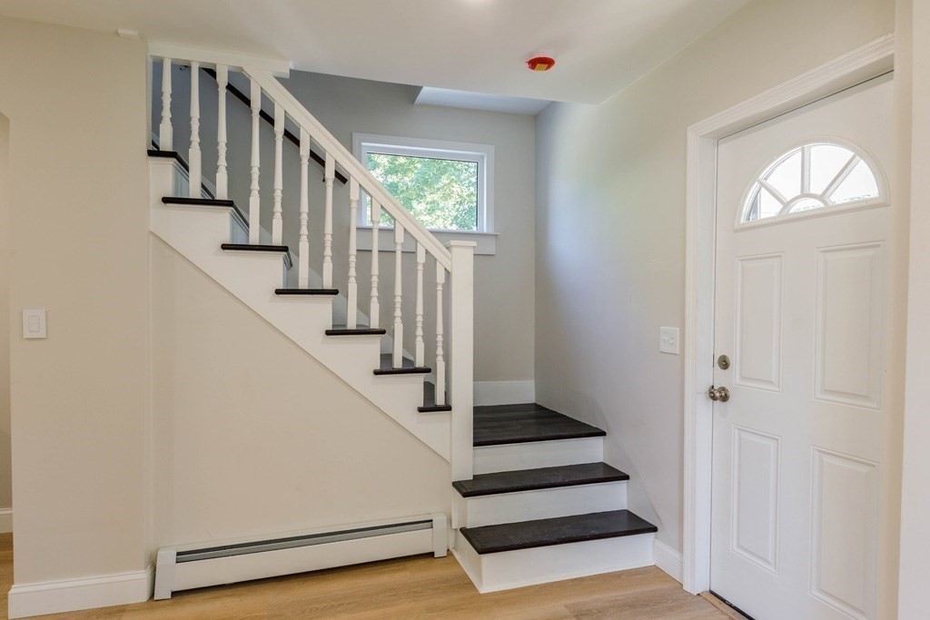 4 Everton Avenue Worcester, MA 01604 - Photo 12 of 26 a view of entryway and hall with wooden floor