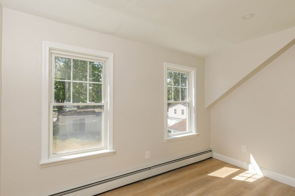 4 Everton Avenue Worcester, MA 01604 - Photo 17 of 26 an empty room with windows