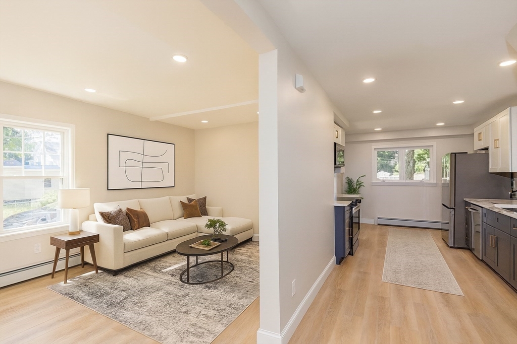 4 Everton Avenue Worcester, MA 01604 - Photo 8 of 26 a living room with furniture and a flat screen tv