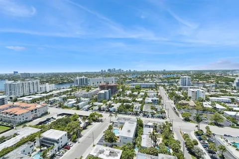 a view of balcony with wooden floor