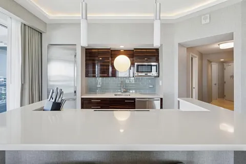a bathroom with a sink vanity and a mirror
