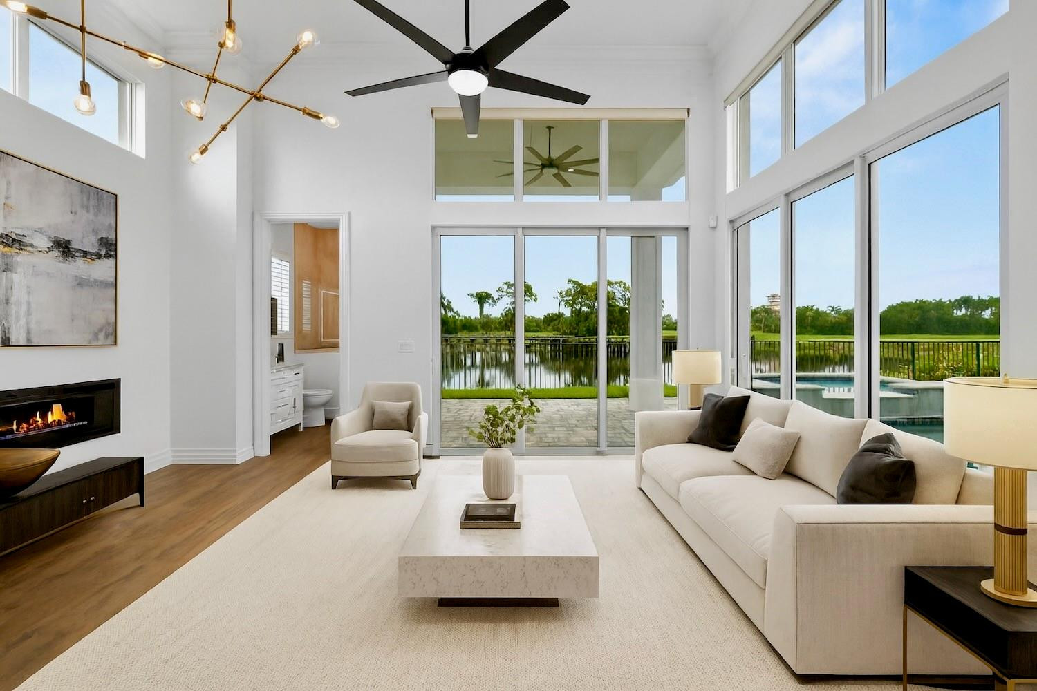 128 Southeast Rio Angelica Port St. Lucie, FL 34984 - Photo 11 of 40 a living room with furniture and a large window