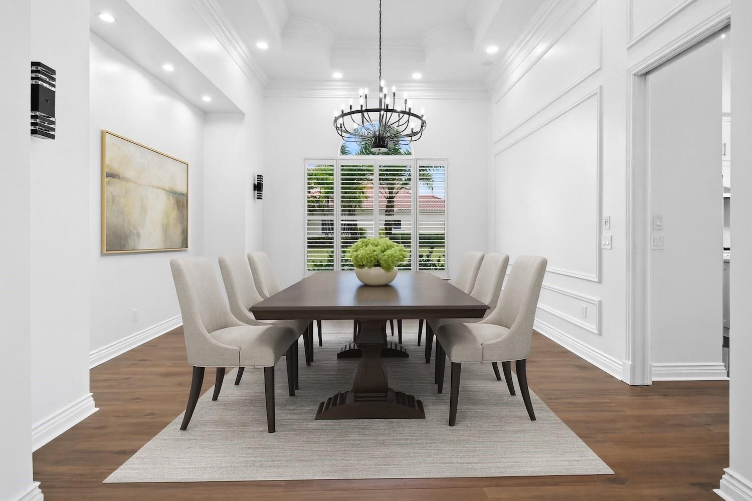 128 Southeast Rio Angelica Port St. Lucie, FL 34984 - Photo 13 of 40 a view of a dining room with furniture window and wooden floor