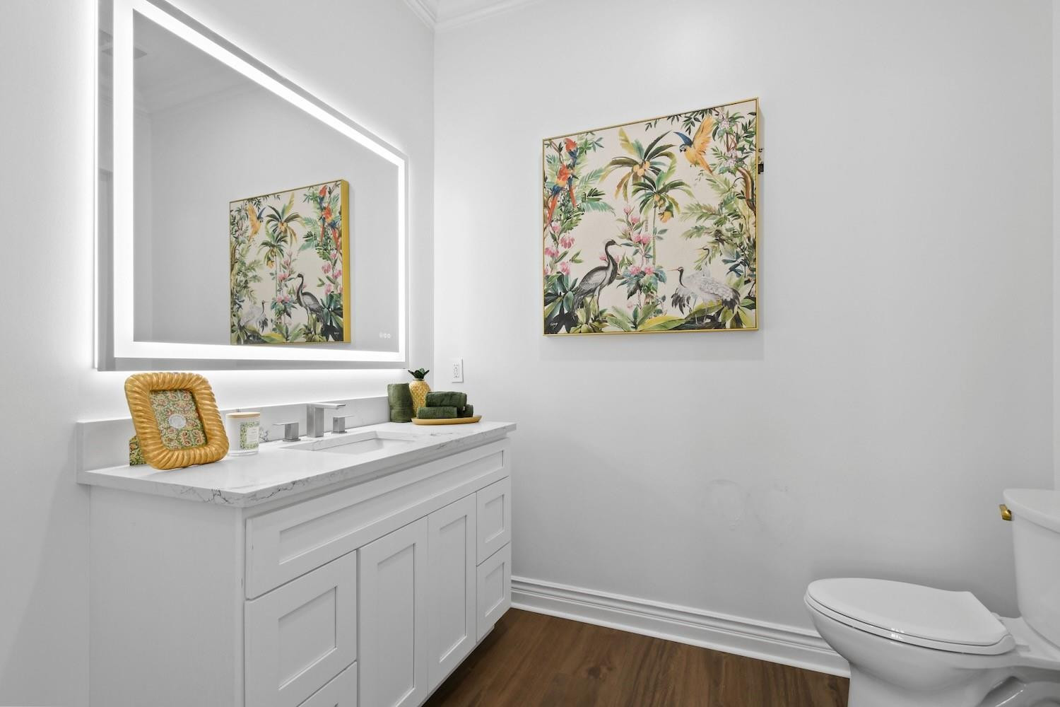 128 Southeast Rio Angelica Port St. Lucie, FL 34984 - Photo 17 of 40 a bathroom with a sink and a toilet