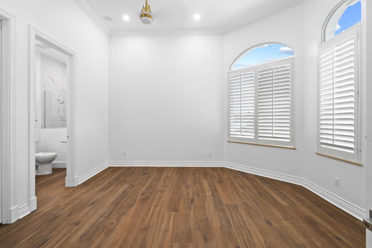 128 Southeast Rio Angelica Port St. Lucie, FL 34984 - Photo 26 of 40 a view of a room with wooden floor and a window