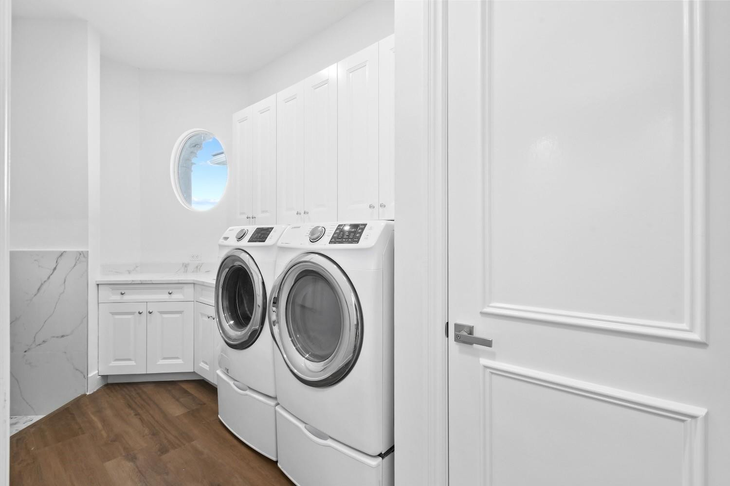 128 Southeast Rio Angelica Port St. Lucie, FL 34984 - Photo 29 of 40 a utility room with dryer and washer