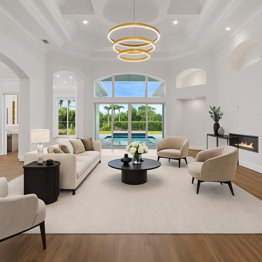 128 Southeast Rio Angelica Port St. Lucie, FL 34984 - Photo 5 of 40 a living room with furniture and a large window