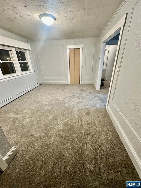 546 Victory Avenue, Unit 2 Ridgefield, NJ 07657 - Photo 4 of 14 a view of an empty room with a window