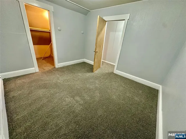 a bathroom with a toilet and a bathtub