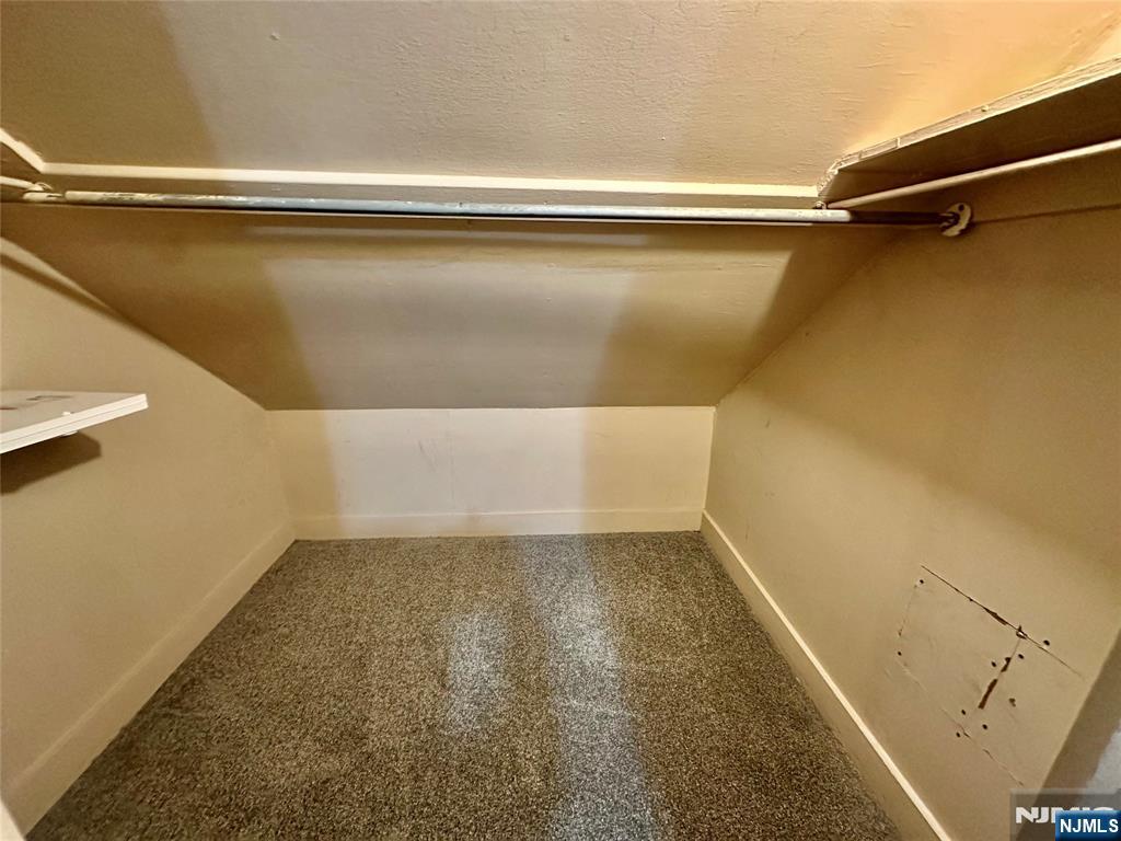 546 Victory Avenue, Unit 2 Ridgefield, NJ 07657 - Photo 10 of 14 a view of a room with racks on the wall