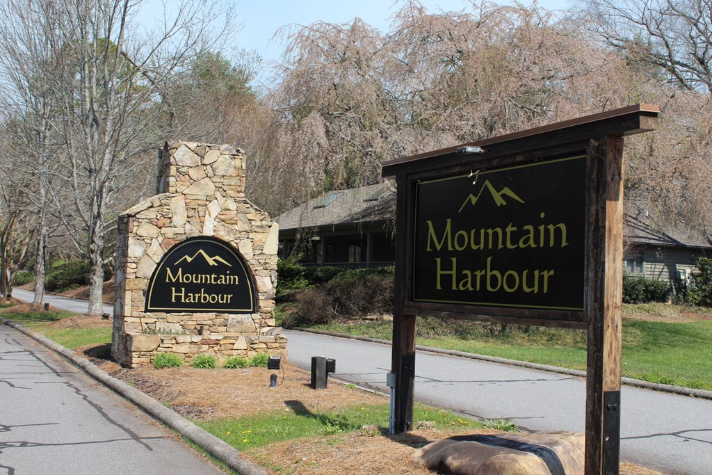 Lot 83 Licklog Ridge Hayesville, NC 28904 - Photo 2 of 6 a sign on the side of a building