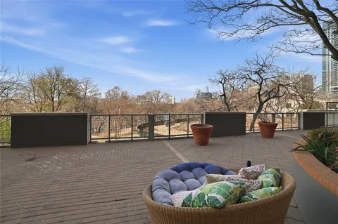 a view of a terrace with couches and a table
