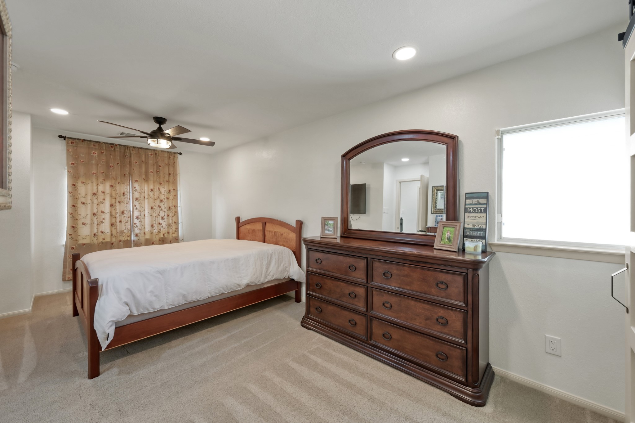 21815 Mossy Field Lane Spring, TX 77388 - Photo 21 of 39 Secondary bedroom #1 upstairs with private ensuite half bath with upgraded features. Perfect for guests or multigenerational living.
