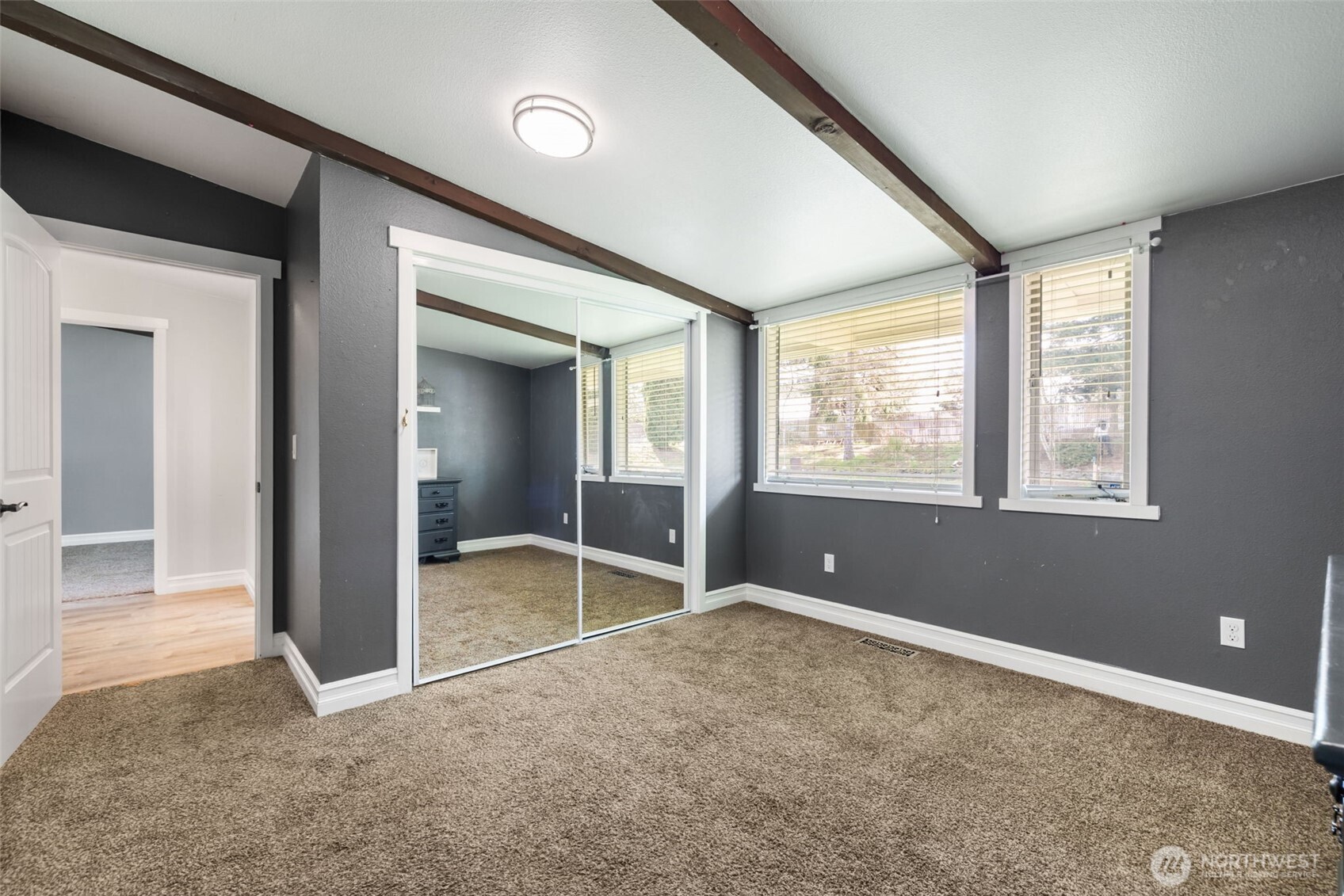 11782 Schold Road Northwest Silverdale, WA 98383 - Photo 17 of 40 an empty room with windows and closet