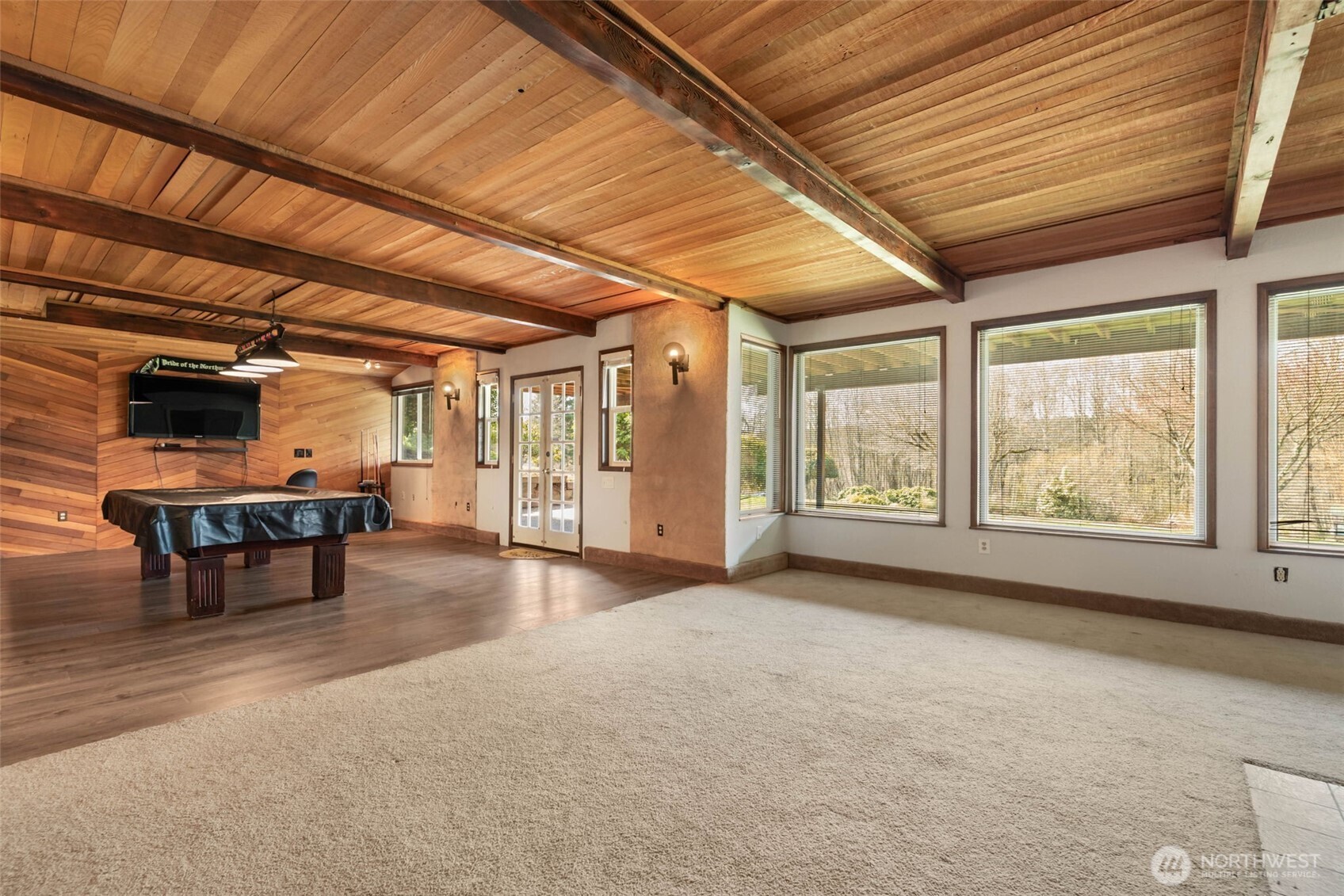 11782 Schold Road Northwest Silverdale, WA 98383 - Photo 19 of 40 a view of a room with furniture and a large window