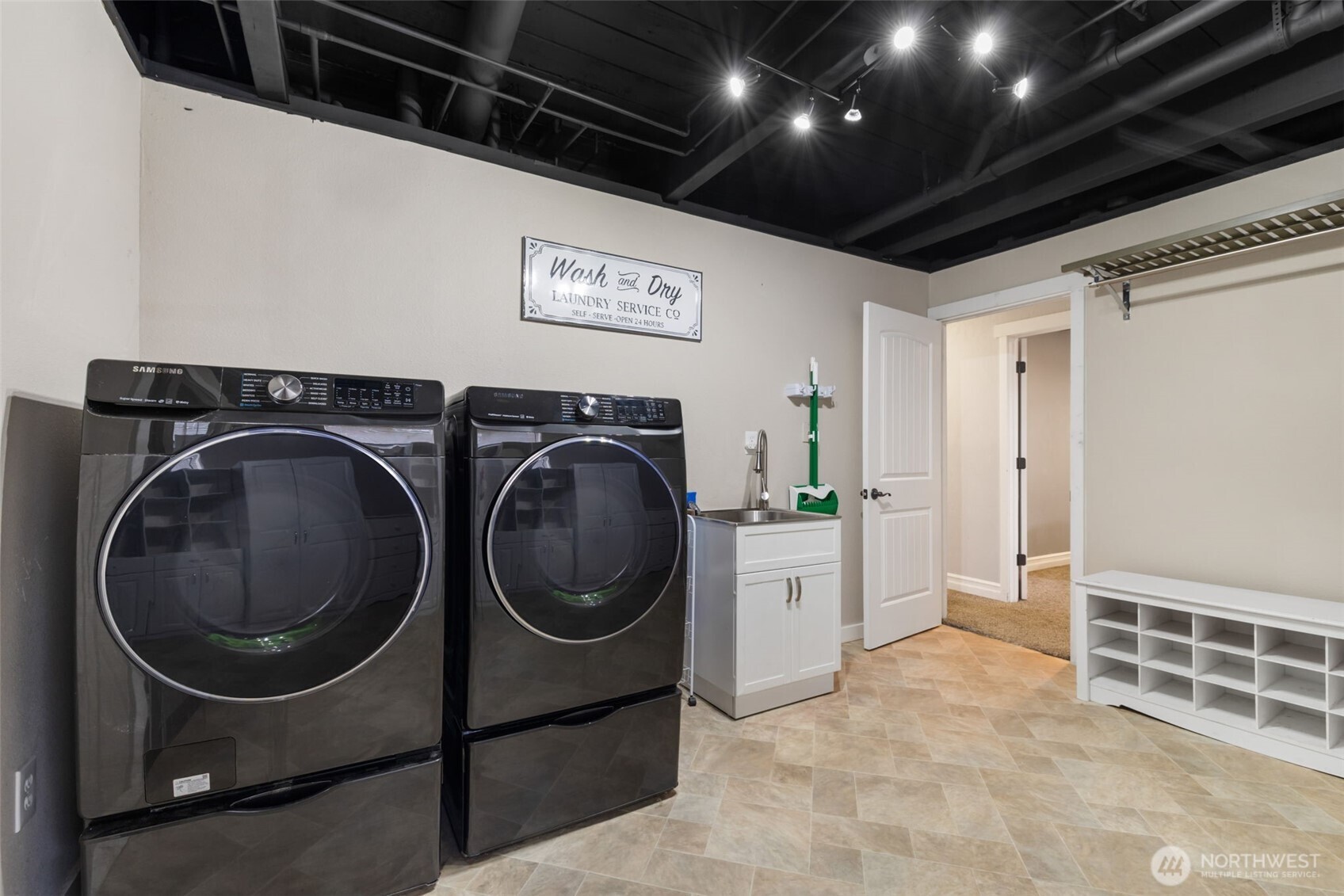 11782 Schold Road Northwest Silverdale, WA 98383 - Photo 23 of 40 a view of a storage & utility room with washer and dryer