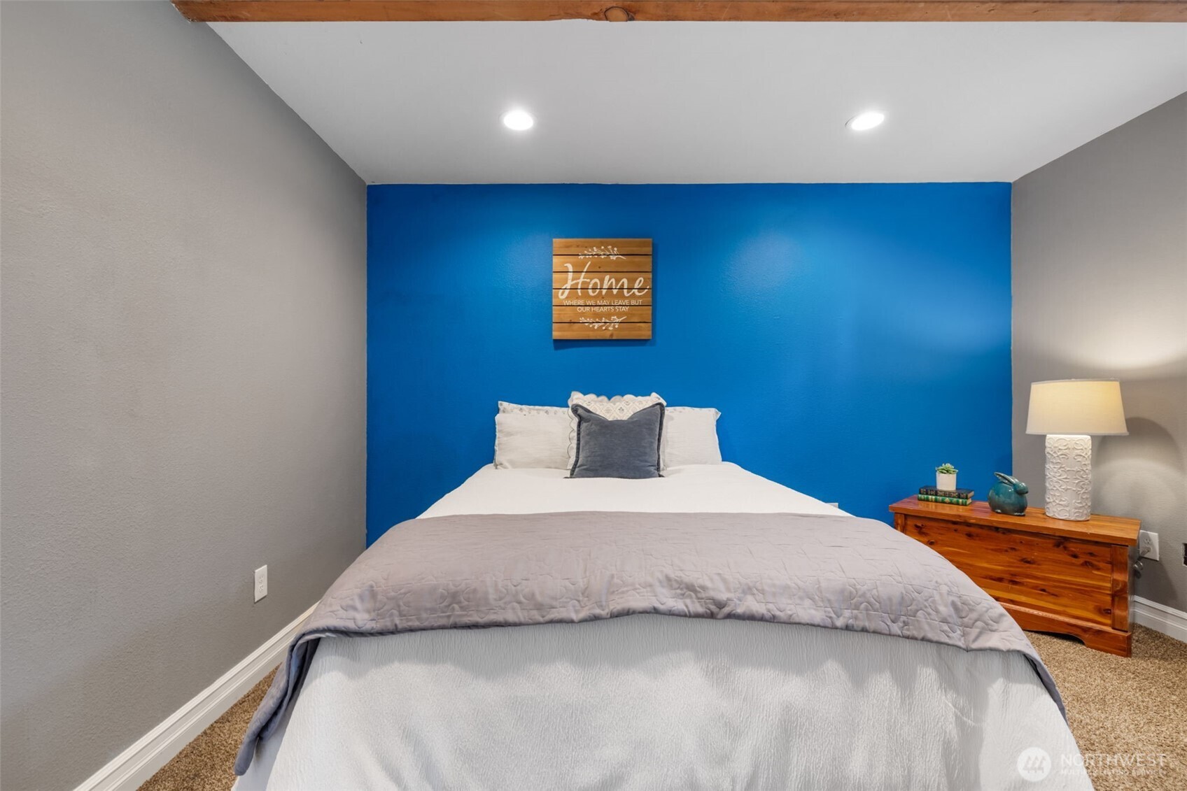 11782 Schold Road Northwest Silverdale, WA 98383 - Photo 24 of 40 a bedroom with a bed and a window