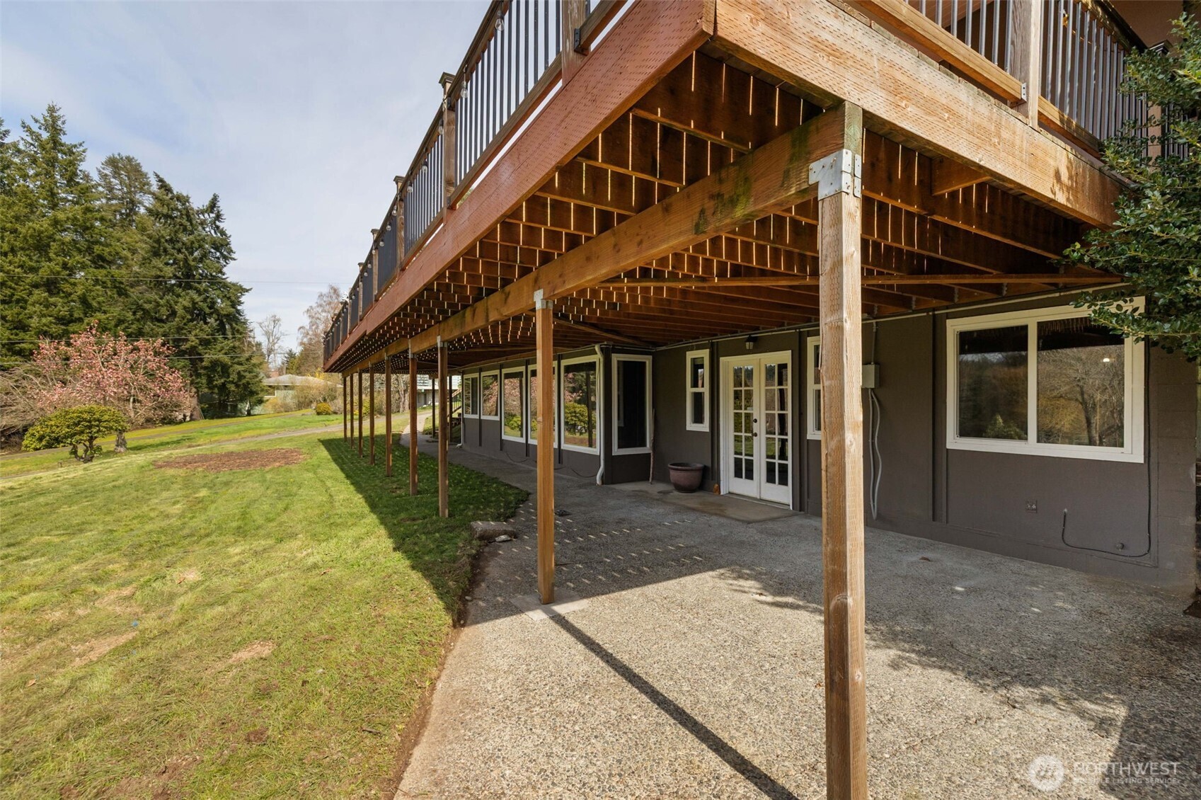 11782 Schold Road Northwest Silverdale, WA 98383 - Photo 27 of 40 a front view of a house with a garden