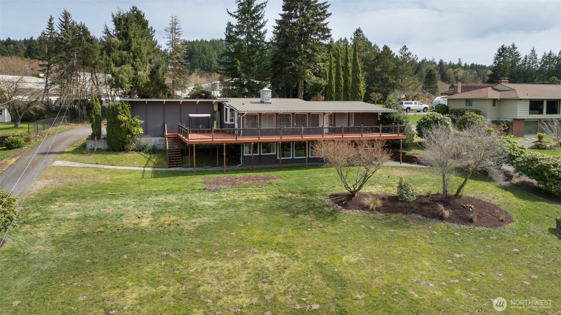 11782 Schold Road Northwest Silverdale, WA 98383 - Photo 38 of 40 a view of a house with a yard