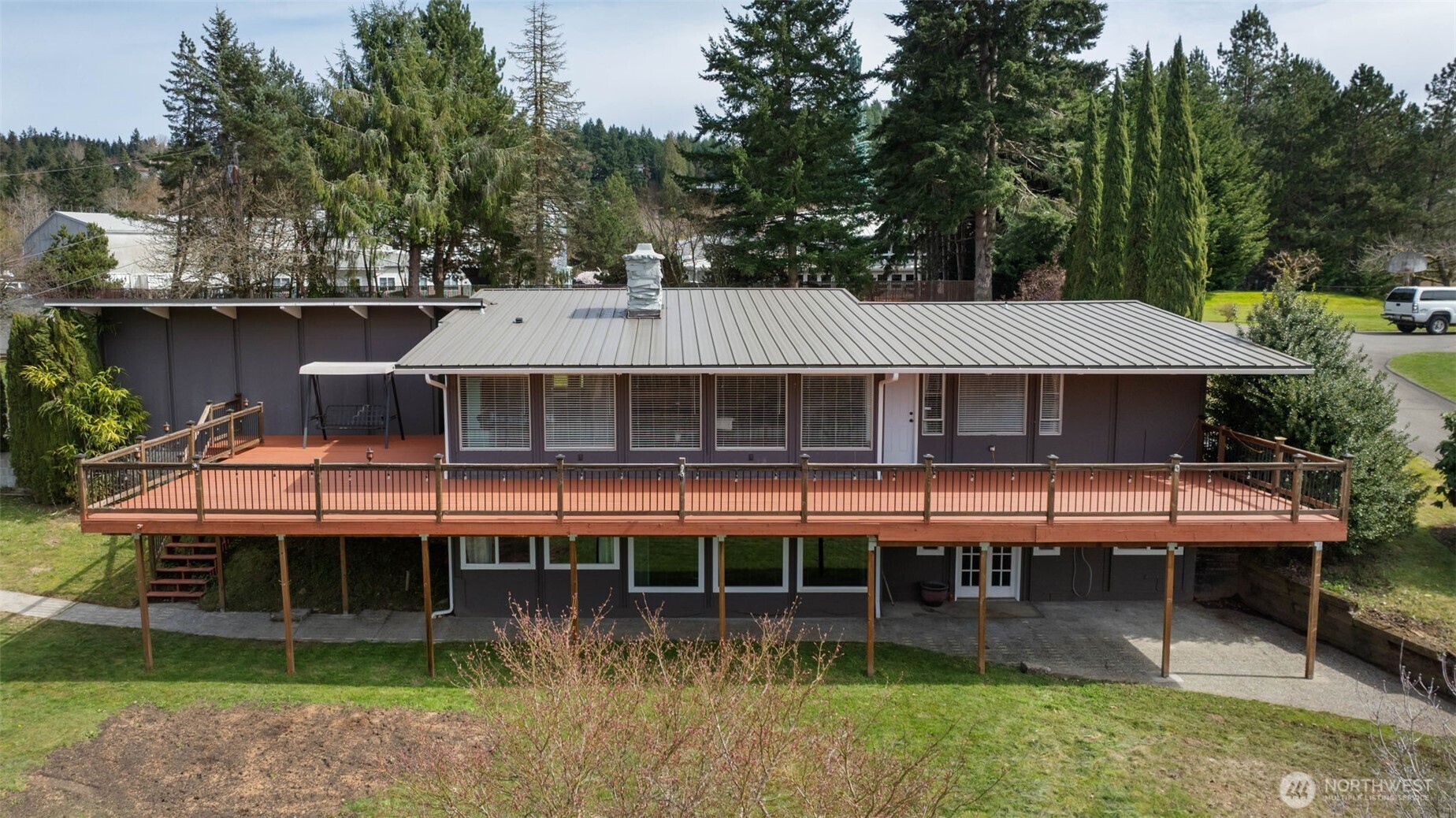 11782 Schold Road Northwest Silverdale, WA 98383 - Photo 40 of 40 a aerial view of a house with swimming pool and porch