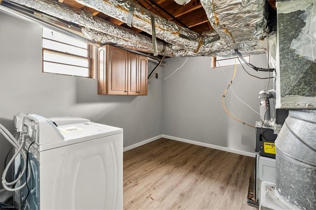2763 Baker Ridge Drive Northwest Atlanta, GA 30318 - Photo 26 of 32 a utility room with dryer and washer