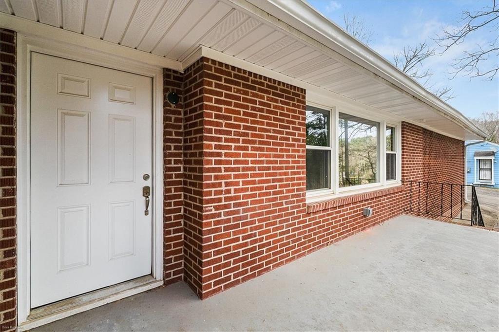 2763 Baker Ridge Drive Northwest Atlanta, GA 30318 - Photo 4 of 32 a view of porch with a bench