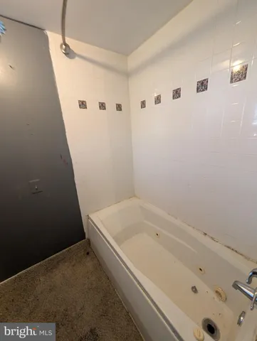 a bathroom with a bathtub