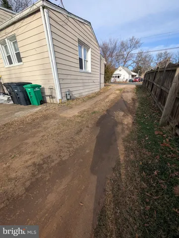 a view of a backyard of the house