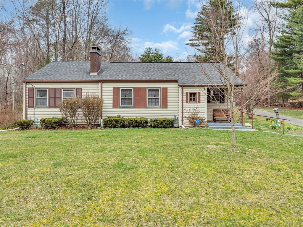 173 Bennett Road Hampden, MA 01036 - Photo 1 of 35 a front view of a house with garden
