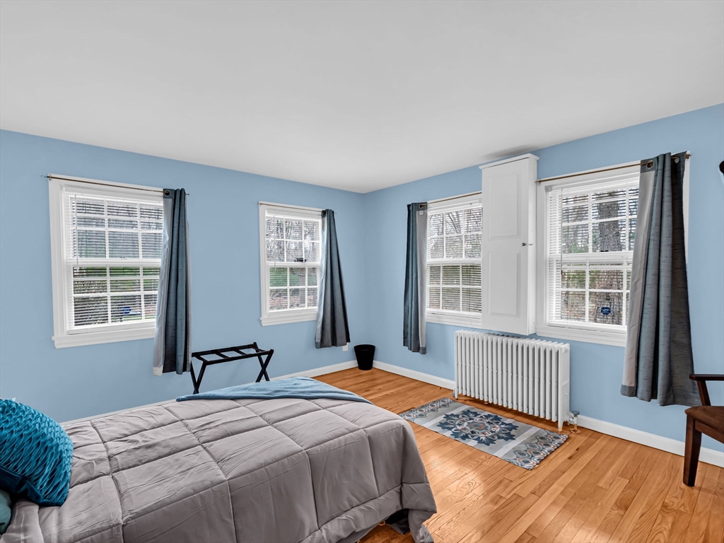 173 Bennett Road Hampden, MA 01036 - Photo 14 of 35 a bedroom with a bed and a window