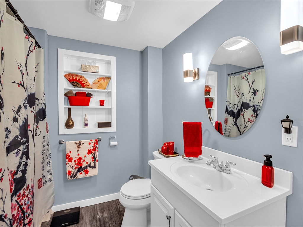 173 Bennett Road Hampden, MA 01036 - Photo 17 of 35 a bathroom with a sink mirror and toilet