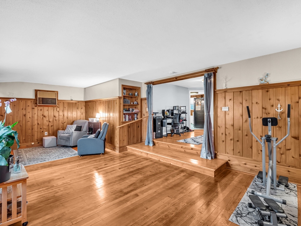 173 Bennett Road Hampden, MA 01036 - Photo 22 of 35 a living room with furniture and a wooden floor