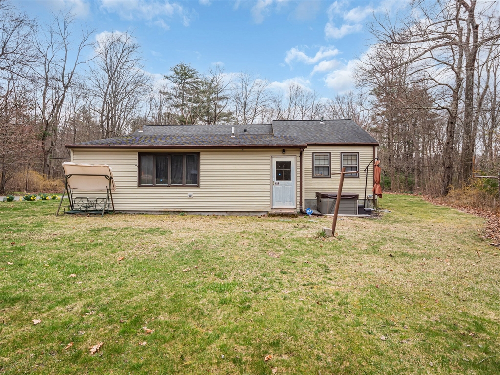 173 Bennett Road Hampden, MA 01036 - Photo 28 of 35 a front view of a house with a yard